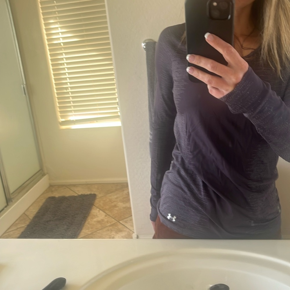 Women’s under Armour, long sleeve shirt, purple. Gently used.